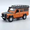 Land Rover Defender 110 1:32 narancs