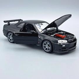 Nissan SKyline GT-R (R34) 1:24 Welly fém modellautó