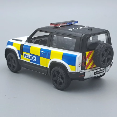 Land Rover Defender 90 Police Kinsmart modell autó