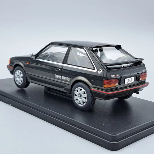 Mazda 323 4WD Turbo 1:24 White Box fém autómodell