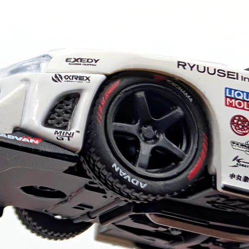 Nissan LB-ER34 1:64 Mini GT modell 1059 autómodell
